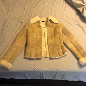 Express leather jacket with fur inside. Size 1/2..very warm!